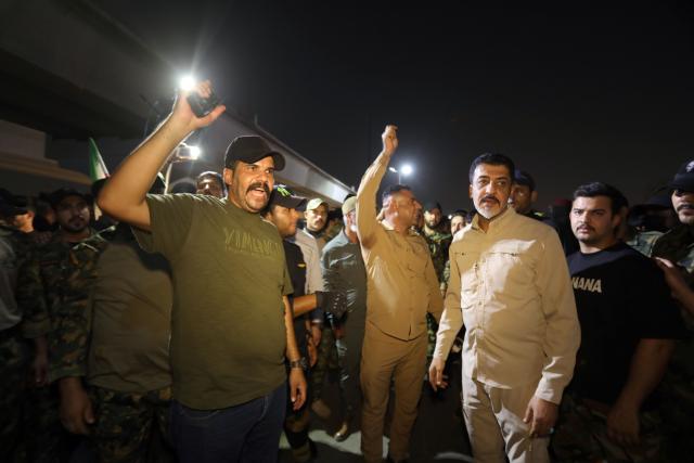 (250614) -- BAGHDAD, June 14, 2025 (Xinhua) -- Demonstrators hold a protest against Israeli attacks on Iran, in Baghdad, Iraq, on June 13, 2025. Earlier on Friday, Israel launched large-scale attacks on multiple targets in Iran, causing damage to Iran's nuclear facilities and casualties. (Xinhua/Khalil Dawood)