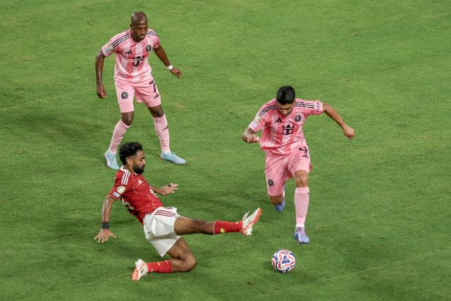(250615) -- MIAMI, June 15, 2025 (Xinhua) -- Hussein El Shahat (bottom L) of Al Ahly vies with Luis Suarez (R) of Inter Miami CF during the opening match between Inter Miami CF of the United States and Al Ahly of Egypt at the FIFA Club World Cup 2025 in Miami, the United States, on June 14, 2025. (Xinhua/Xu Zijian)