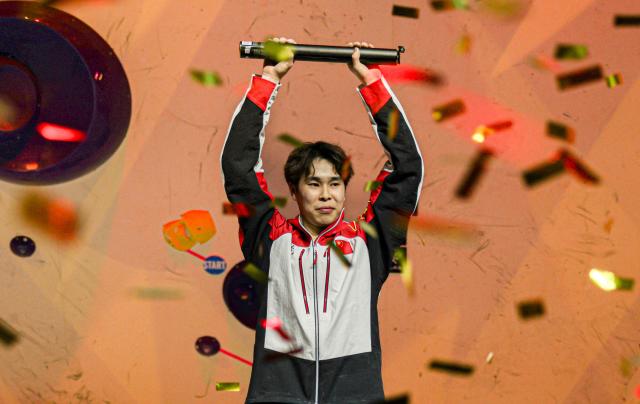 (250617) -- BEIJING, June 17, 2025 (Xinhua) -- Pan Yufei of China celebrates after winning the men's boulder final at the International Federation of Sport Climbing (IFSC) World Cup in Bern, Switzerland, June 15, 2025.
  Chinese Olympian climber Pan Yufei became the first Chinese to win the men's Boulder event of the International Federation of Sport Climbing World Cup. (Photo by Liu Sheng/Xinhua)