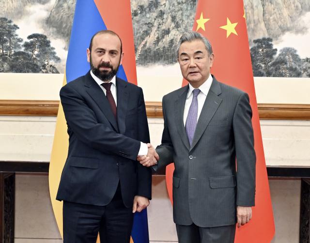 (250626) -- BEIJING, June 26, 2025 (Xinhua) -- Chinese Foreign Minister Wang Yi, also a member of the Political Bureau of the Communist Party of China Central Committee, holds talks with Armenian Minister of Foreign Affairs Ararat Mirzoyan in Beijing, capital of China, June 26, 2025. (Xinhua/Yin Bogu)