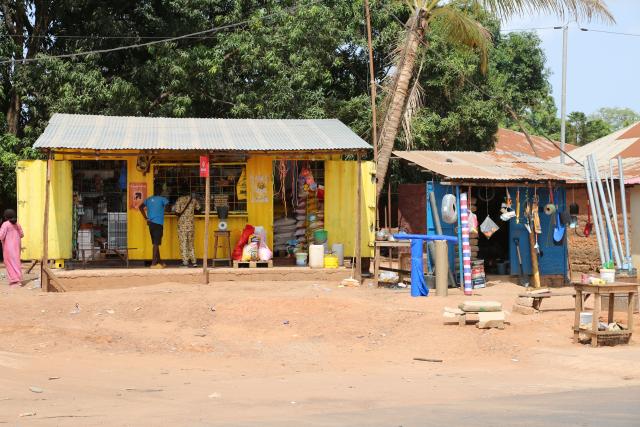 (250628) -- BISSAU, June 28, 2025 (Xinhua) -- This photo taken on June 15, 2025 shows shops alongside a highway constructed by a Chinese company in Safim, Guinea-Bissau. The China-funded highway, which links the capital Bissau to its suburb of Safim, inaugurated on June 16.
   The highway, covering a distance of 8.2 kilometers, was constructed by Chinese company Longjian Road & Bridge Co., Ltd. and fully financed by the Chinese government at a cost of 30 million U.S. dollars. (Xinhua/Zhang Jian)