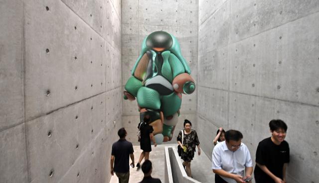 (250630) -- BEIJING, June 30, 2025 (Xinhua) -- People visit the digital art exhibition "Future You: Code and Soul" at the 798 art zone in Beijing, capital of China, June 29, 2025. (Xinhua/Li Xin)