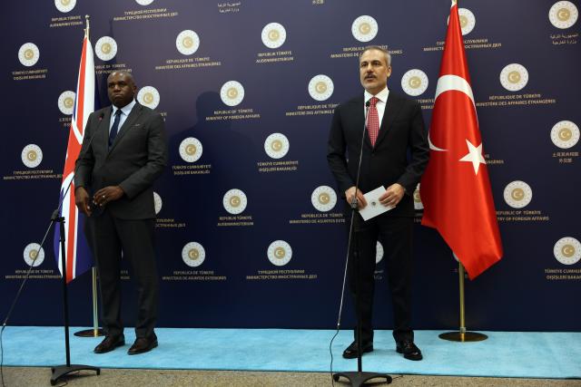 (250630) -- ANKARA, June 30, 2025 (Xinhua) -- Turkish Foreign Minister Hakan Fidan (R) and British Foreign Secretary David Lammy hold a press conference in Ankara, Türkiye, on June 30, 2025. Turkish Foreign Minister Hakan Fidan on Monday hailed Türkiye's "intense cooperation" with Britain and called for further expansion of bilateral trade. (Mustafa Kaya/Handout via Xinhua)