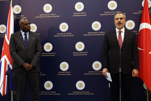 (250630) -- ANKARA, June 30, 2025 (Xinhua) -- Turkish Foreign Minister Hakan Fidan (R) and British Foreign Secretary David Lammy hold a press conference in Ankara, Türkiye, on June 30, 2025. Turkish Foreign Minister Hakan Fidan on Monday hailed Türkiye's "intense cooperation" with Britain and called for further expansion of bilateral trade. (Mustafa Kaya/Handout via Xinhua)
