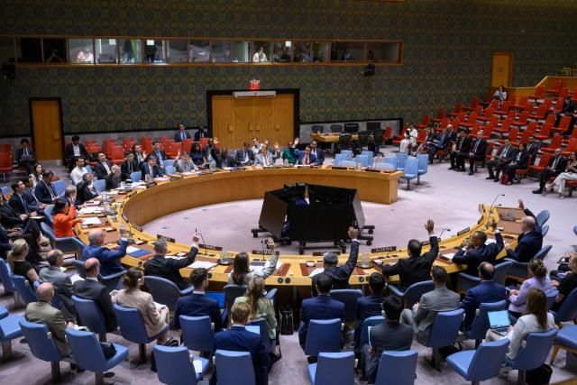(250630) -- UNITED NATIONS, June 30, 2025 (Xinhua) -- Representatives vote on a draft resolution during a UN Security Council meeting at the UN headquarters in New York, on June 30, 2025. The Security Council on Monday unanimously adopted a resolution to extend the mandate of the UN peacekeeping force on the Golan Heights for six months until Dec. 31, 2025. (Loey Felipe/UN Photo/Handout via Xinhua)