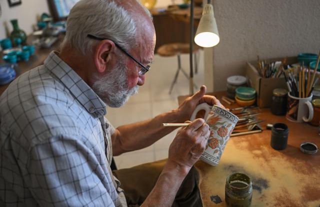 (250630) -- IZNIK (TÜRKIYE), June 30, 2025 (Xinhua) -- Master artisan Adil Can Guven makes a porcelain work at his studio in Iznik, Türkiye, on June 26, 2025. In the historic town of Iznik in northwestern Türkiye, renowned for its centuries-old ceramic tradition, master artisan Adil Can Guven is devoted to preserving and revitalizing this ancient craft. (Xinhua/Liu Lei) TO GO WITH Interview: Turkish master highlights enduring porcelain bond between Iznik, China