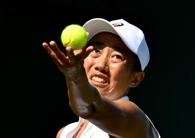 (250701) -- LONDON, July 1, 2025 (Xinhua) -- Zhang Shuai serves during the women's singles first round match between Zhang Shuai of China and Olga Danilovic of Serbia at Wimbledon tennis Championship in London, Britain, June 30, 2025. (Xinhua/Li Ying)