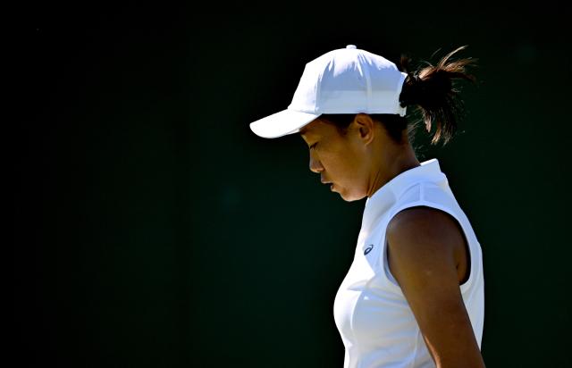 (250701) -- LONDON, July 1, 2025 (Xinhua) -- Zhang Shuai reacts during the women's singles first round match between Zhang Shuai of China and Olga Danilovic of Serbia at Wimbledon tennis Championship in London, Britain, June 30, 2025. (Xinhua/Li Ying)