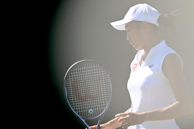 (250701) -- LONDON, July 1, 2025 (Xinhua) -- Zhang Shuai reacts during the women's singles first round match between Zhang Shuai of China and Olga Danilovic of Serbia at Wimbledon tennis Championship in London, Britain, June 30, 2025. (Xinhua/Li Ying)