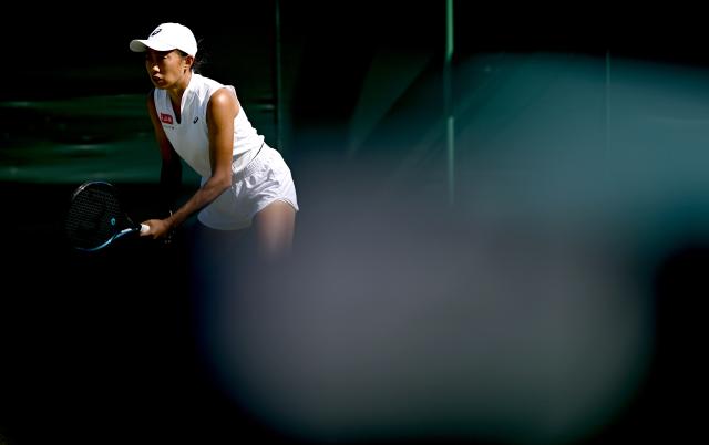 (250701) -- LONDON, July 1, 2025 (Xinhua) -- Zhang Shuai reacts during the women's singles first round match between Zhang Shuai of China and Olga Danilovic of Serbia at Wimbledon tennis Championship in London, Britain, June 30, 2025. (Xinhua/Li Ying)