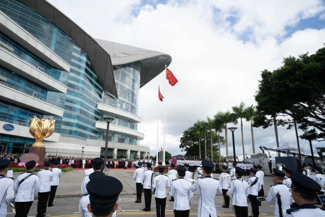 (250701) -- HONG KONG, July 1, 2025 (Xinhua) -- A flag-raising ceremony is held by the government of the Hong Kong Special Administrative Region (HKSAR) to celebrate the 28th anniversary of Hong Kong's return to the motherland at the Golden Bauhinia Square in Hong Kong, south China, July 1, 2025. (Xinhua/Lui Siu Wai)
