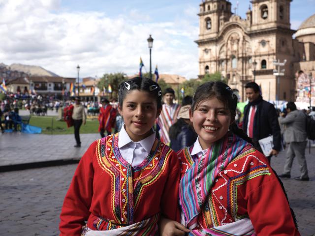 (250701) -- CUSCO, July 1, 2025 (Xinhua) -- This photo taken on June 20, 2025 shows girls posing in traditional costumes during Inti Raymi, or the Festival of the Sun, in Cusco, Peru. TO GO WITH "Feature: Peru celebrates ancient Inca Festival of Sun" (Xinhua/Zhao Kai)