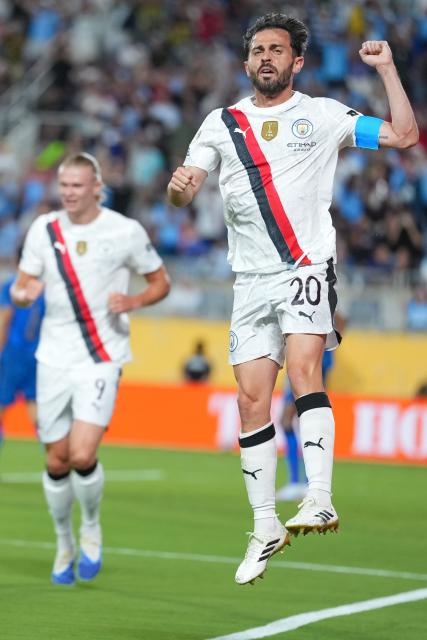 (250701) -- ORLANDO, July 1, 2025 (Xinhua) -- Bernardo Silva (R) of Manchester City celebrates scoring during the round of 16 match between Manchester City of England and Al Hilal of Saudi Arabia at the FIFA Club World Cup 2025 at the Camping World Stadium, Orlando, Florida, the United States, June 30, 2025. (Xinhua/Xu Chang)