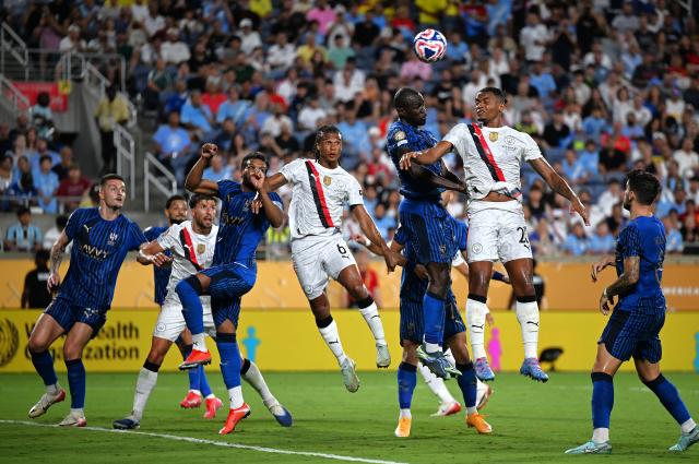 (250701) -- ORLANDO, July 1, 2025 (Xinhua) -- Kalidou Koulibaly (Top L) of Al Hilal and Manuel Akanji (Top R) of Manchester City head the ball during the round of 16 match between Manchester City of England and Al Hilal of Saudi Arabia at the FIFA Club World Cup 2025 at the Camping World Stadium, Orlando, Florida, the United States, June 30, 2025. (Xinhua/Wu Xiaoling)