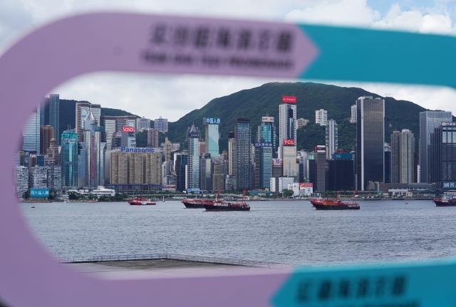 (250701) -- HONG KONG, July 1, 2025 (Xinhua) -- Fishing vessels cruise at Victoria Harbour in Hong Kong, south China, July 1, 2025. Fishing vessels take part in a cruise held by the Hong Kong Fishermen Consortium to celebrate the 28th anniversary of Hong Kong's return to the motherland at Victoria Harbour on Tuesday. (Xinhua/Wang Shen)