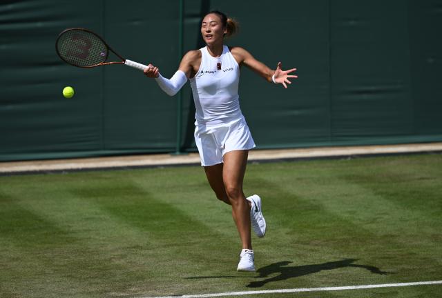 (250701) -- LONDON, July 1, 2025 (Xinhua) -- Zheng Qinwen hits a return during the women's singles first round match between Zheng Qinwen of China and Katerina Siniakova of the Czech Republic at the Wimbledon Tennis Championships in London, Britain, July 1, 2025. (Xinhua/Li Ying)