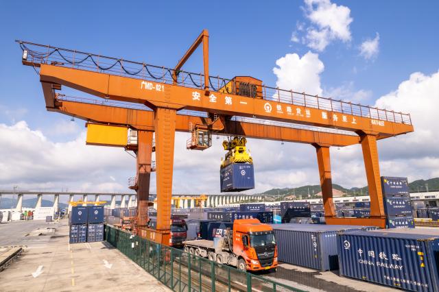 (250701) -- HUAIHUA, July 1, 2025 (Xinhua) -- An aerial drone photo taken on June 13, 2024 shows a view inside the international land port of Huaihua City, central China's Hunan Province. Huaihua is the province's node city along the New International Land-Sea Trade Corridor and a freight assembly center for ASEAN countries. (Xinhua/Chen Sihan)