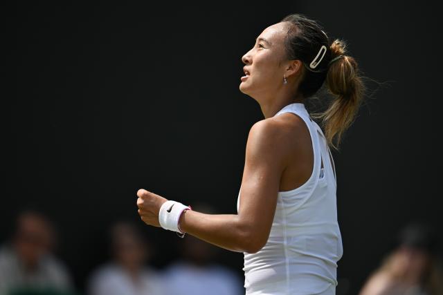 (250702) -- LONDON, July 2, 2025 (Xinhua) -- Zheng Qinwen reacts during the women's singles first round match between Zheng Qinwen of China and Katerina Siniakova of the Czech Republic at the Wimbledon Tennis Championships in London, Britain, July 1, 2025. (Xinhua/Zhao Dingzhe)