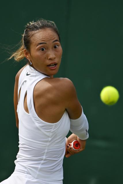 (250702) -- LONDON, July 2, 2025 (Xinhua) -- Zheng Qinwen reacts during the women's singles first round match between Zheng Qinwen of China and Katerina Siniakova of the Czech Republic at the Wimbledon Tennis Championships in London, Britain, July 1, 2025. (Xinhua/Zhao Dingzhe)