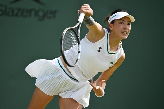 (250702) -- LONDON, July 2, 2025 (Xinhua) -- Wang Xinyu competes during the women's singles first round match between Wang Xinyu of China and Karolina Muchova of the Czech Republic at the Wimbledon Tennis Championships in London, Britain, July 1, 2025. (Xinhua/Zhao Dingzhe)