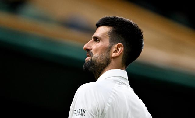 (250702) -- LONDON, July 2, 2025 (Xinhua) -- Novak Djokovic reacts during the men's singles first round match between Novak Djokovic of Serbia and Alexandre Muller of France at the Wimbledon Tennis Championships in London, Britain, July 1, 2025. (Xinhua/Li Ying)