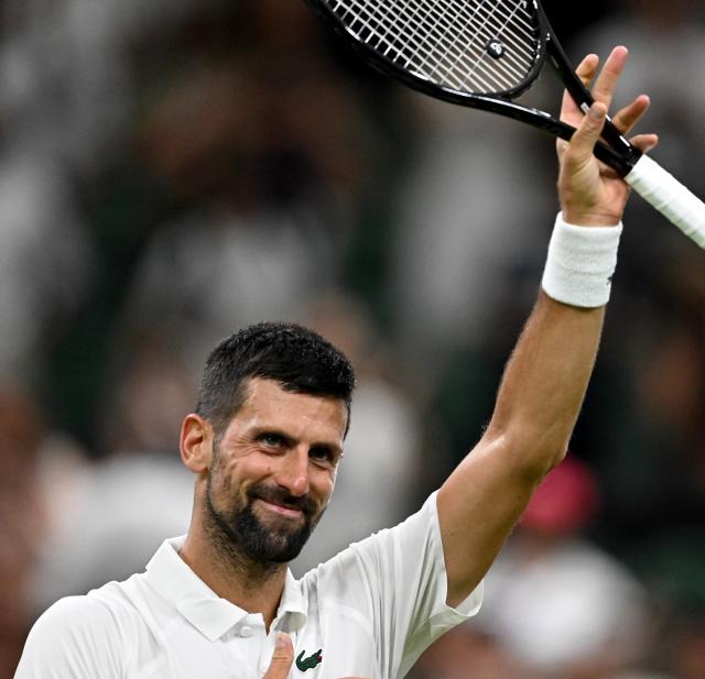 (250702) -- LONDON, July 2, 2025 (Xinhua) -- Novak Djokovic celebrates winning the men's singles first round match between Novak Djokovic of Serbia and Alexandre Muller of France at the Wimbledon Tennis Championships in London, Britain, July 1, 2025. (Xinhua/Li Ying)