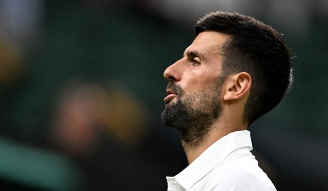 (250702) -- LONDON, July 2, 2025 (Xinhua) -- Novak Djokovic reacts during the men's singles first round match between Novak Djokovic of Serbia and Alexandre Muller of France at the Wimbledon Tennis Championships in London, Britain, July 1, 2025. (Xinhua/Li Ying)