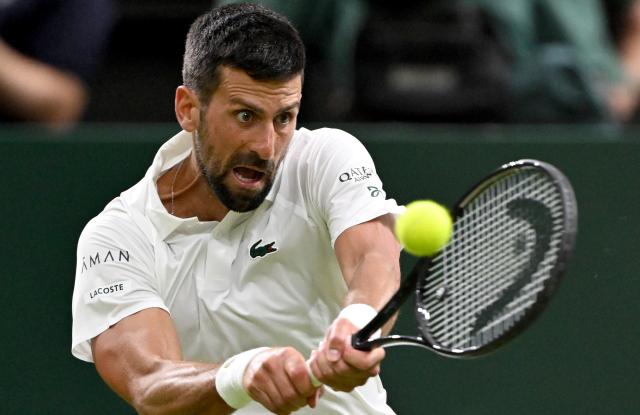 (250702) -- LONDON, July 2, 2025 (Xinhua) -- Novak Djokovic hits a return during the men's singles first round match between Novak Djokovic of Serbia and Alexandre Muller of France at the Wimbledon Tennis Championships in London, Britain, July 1, 2025. (Xinhua/Li Ying)