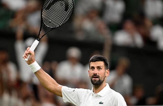 (250702) -- LONDON, July 2, 2025 (Xinhua) -- Novak Djokovic celebrates winning the men's singles first round match between Novak Djokovic of Serbia and Alexandre Muller of France at the Wimbledon Tennis Championships in London, Britain, July 1, 2025. (Xinhua/Li Ying)