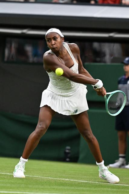 (250702) -- LONDON, July 2, 2025 (Xinhua) -- Coco Gauff competes during the women's singles first round match between Coco Gauff of the United States and Dayana Yastremska of Ukraine at the Wimbledon Tennis Championships in London, Britain, July 1, 2025. (Xinhua/Zhao Dingzhe)
