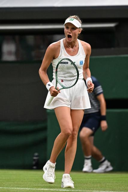 (250702) -- LONDON, July 2, 2025 (Xinhua) -- Dayana Yastremska celebrates scoring during the women's singles first round match between Coco Gauff of the United States and Dayana Yastremska of Ukraine at the Wimbledon Tennis Championships in London, Britain, July 1, 2025. (Xinhua/Zhao Dingzhe)