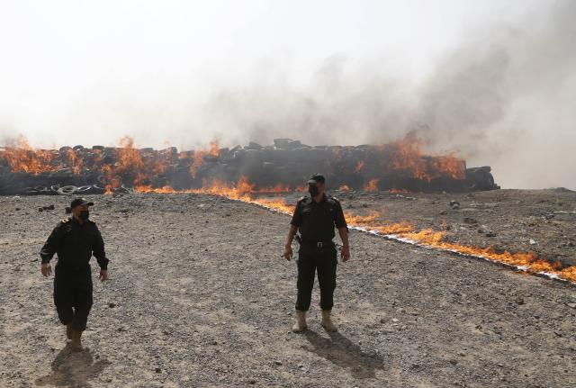 (250702) -- SANAA, July 2, 2025 (Xinhua) -- This photo taken on July 1, 2025 shows a site where illicit narcotics are being burned near Sanaa, Yemen.
  Security forces of Yemen's Houthi group destroyed approximately 19 tons of narcotics, hashish and other illegal drugs here on Tuesday. (Photo by Mohammed Mohammed/Xinhua)