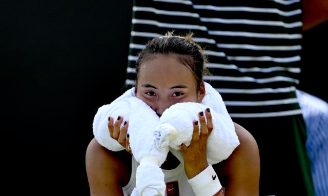 (250702) -- BEIJING, July 2, 2025 (Xinhua) -- Zheng Qinwen reacts during the women's singles first round match between Zheng Qinwen of China and Katerina Siniakova of the Czech Republic at the Wimbledon Tennis Championships in London, Britain, July 1, 2025. (Xinhua/Li Ying)
