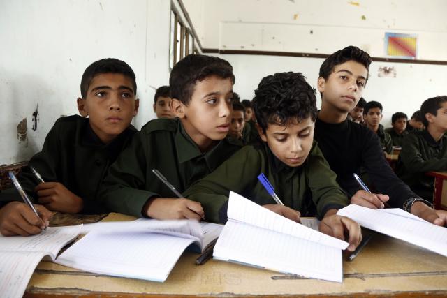 (250702) -- BEIJING, July 2, 2025 (Xinhua) -- Students attend a class in Sanaa, Yemen, June 30, 2025. The new school year for schools in Yemen's capital Sanaa and northern provinces was officially launched on June 28, 2025. (Photo by Mohammed Mohammed/Xinhua)