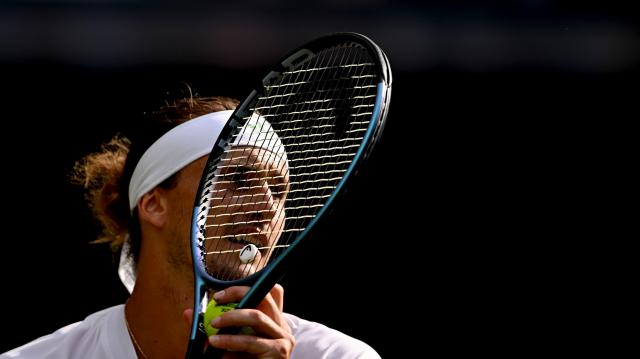 (250702) -- LONDON, July 2, 2025 (Xinhua) -- Alexander Zverev prepares to serve during the men's singles first round match between Alexander Zverev of Germany and Arthur Rinderknech of France at the Wimbledon Tennis Championships in London, Britain, July 1, 2025. (Xinhua/Li Ying)