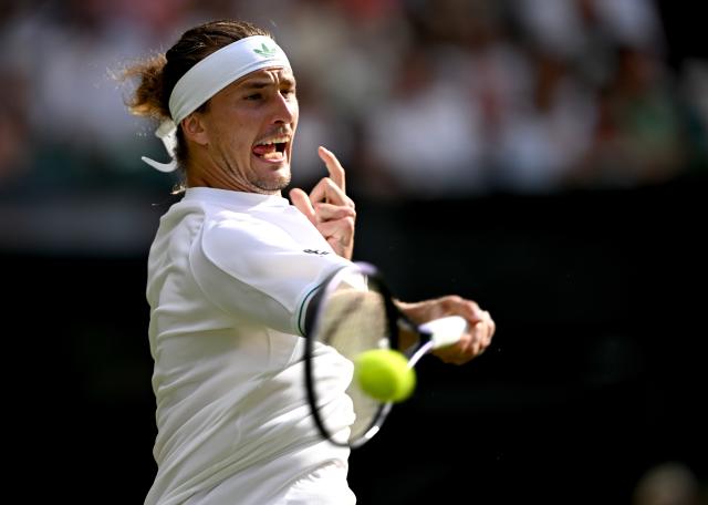 (250702) -- LONDON, July 2, 2025 (Xinhua) -- Alexander Zverev hits a return during the men's singles first round match between Alexander Zverev of Germany and Arthur Rinderknech of France at the Wimbledon Tennis Championships in London, Britain, July 1, 2025. (Xinhua/Li Ying)