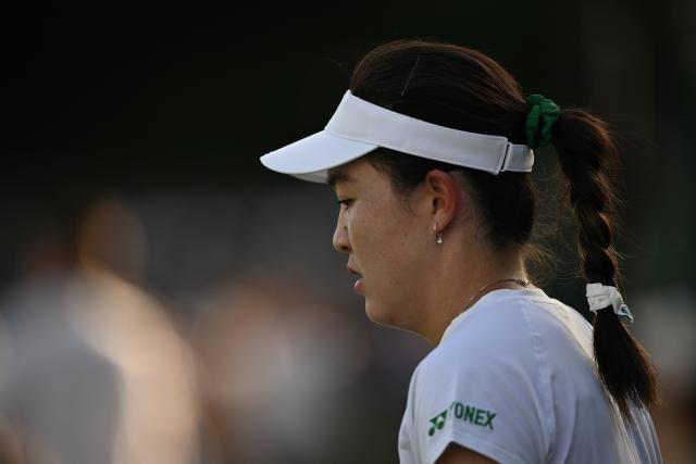 (250702) -- LONDON, July 2, 2025 (Xinhua) -- Zhu Lin reacts during the women's singles first round match between Zhu Lin of China and Veronika Kudermetova of Russia at the Wimbledon Tennis Championships in London, Britain, July 1, 2025. (Xinhua/Li Ying)