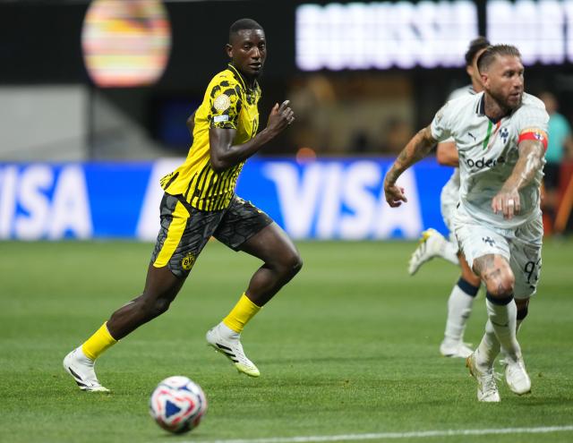 (250702) -- ATLANTA, July 2, 2025 (Xinhua) -- Borussia Dortmund's Serhou Guirassy (L) competes during the round of 16 match between Borussia Dortmund of Germany and CF Monterrey of Mexico at the FIFA Club World Cup 2025 at the Mercedes-Benz Stadium, Atlanta, Georgia, the United States, July 1, 2025. (Xinhua/Huang Zongzhi)