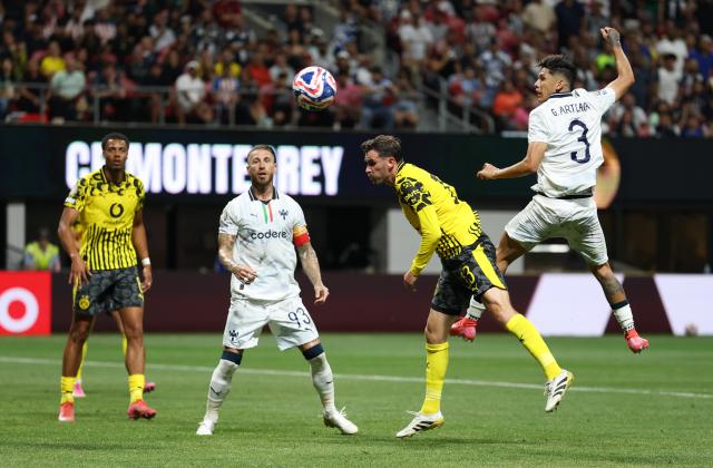 (250702) -- ATLANTA, July 2, 2025 (Xinhua) -- Borussia Dortmund's Pascal Gross (2nd R) and CF Monterrey's Gerardo Arteaga (1st R) vie for the ball during the round of 16 match between Borussia Dortmund of Germany and CF Monterrey of Mexico at the FIFA Club World Cup 2025 at the Mercedes-Benz Stadium, Atlanta, Georgia, the United States, July 1, 2025. (Xinhua/Li Ming)