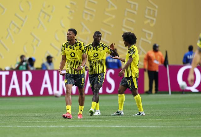 (250702) -- ATLANTA, July 2, 2025 (Xinhua) -- Borussia Dortmund's Serhou Guirassy (C) celebrates scoring with his teammate Felix Nmecha (L) and Karim Adeyemi during the round of 16 match between Borussia Dortmund of Germany and CF Monterrey of Mexico at the FIFA Club World Cup 2025 at the Mercedes-Benz Stadium, Atlanta, Georgia, the United States, July 1, 2025. (Xinhua/Li Ming)