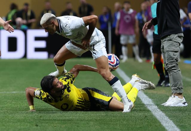 (250702) -- ATLANTA, July 2, 2025 (Xinhua) -- CF Monterrey's German Berterame (up) vies with Borussia Dortmund's Ramy Bensebaini during the round of 16 match between Borussia Dortmund of Germany and CF Monterrey of Mexico at the FIFA Club World Cup 2025 at the Mercedes-Benz Stadium, Atlanta, Georgia, the United States, July 1, 2025. (Xinhua/Li Ming)