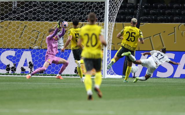 (250702) -- ATLANTA, July 2, 2025 (Xinhua) -- Gregor Kobel (1st L), Borussia Dortmund's goalkeeper, makes a save during the round of 16 match between Borussia Dortmund of Germany and CF Monterrey of Mexico at the FIFA Club World Cup 2025 at the Mercedes-Benz Stadium, Atlanta, Georgia, the United States, July 1, 2025. (Xinhua/Li Ming)