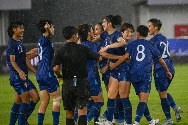 (250702) -- TANGERANG, July 2, 2025 (Xinhua) -- Players of Chinese Taipei celebrate after scoring during the AFC Women's Asian Cup 2026 Qualifiers Group D football match between Kyrgyzstan and Chinese Taipei in Tangerang, Indonesia, July 2, 2025. (Xinhua/Agung Kuncahya B.)