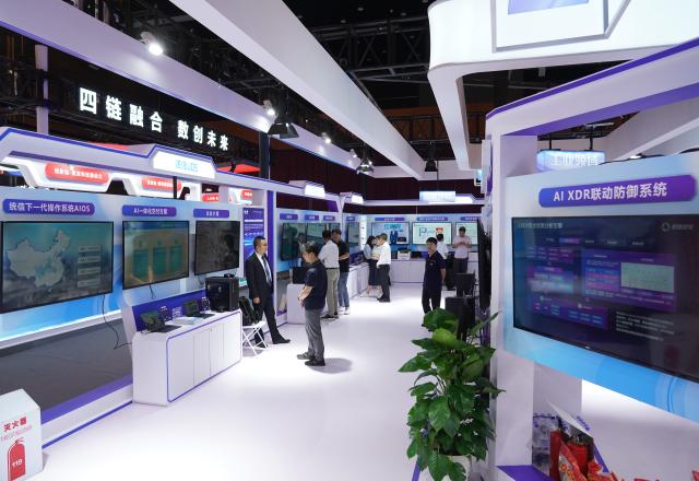 (250702) -- BEIJING, July 2, 2025 (Xinhua) -- This photo taken on July 2, 2025 shows an exhibition area of the 2025 Global Digital Economy Conference in Beijing, capital of China. With the theme "Building a Digital-Friendly City", the 2025 Global Digital Economy Conference opened here on Wednesday. (Xinhua/Zhang Chenlin)