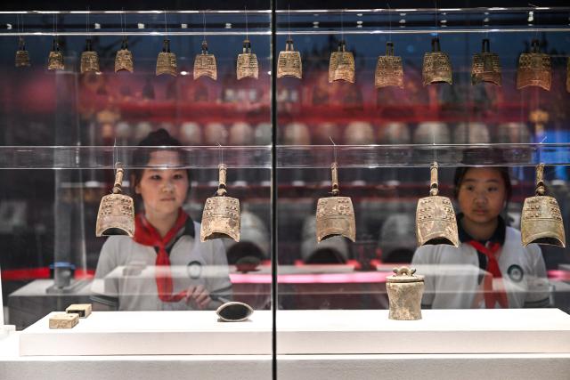 (250702) -- XUYI, July 2, 2025 (Xinhua) -- Students visit a museum featuring Han Dynasty (202 BC-220 AD) tombs to spend their summer time in Xuyi, east China's Jiangsu Province, July 2, 2025. The museum of Han king's mausoleum at Dayun Mountain in Xuyi stages several featured exhibitions in this summer holiday to attract people to visit and learn about history knowledge. (Xinhua/Ji Chunpeng)