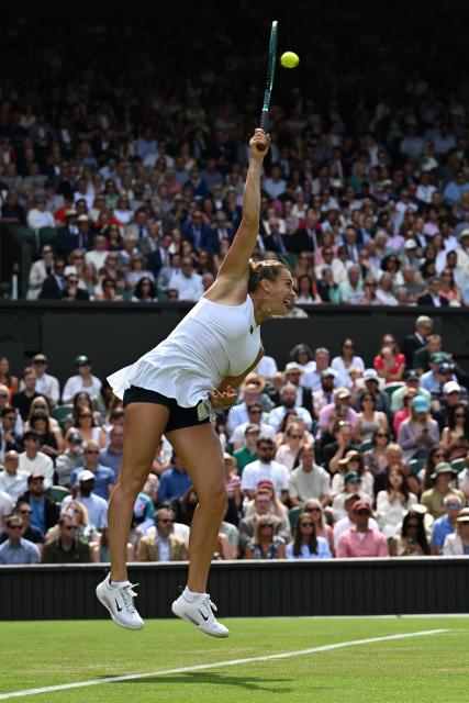(250703) -- LONDON, July 3, 2025 (Xinhua) -- Aryna Sabalenka competes during the women's singles second round match between Aryna Sabalenka of Belarus and Marie Bouzkova of the Czech Republic at the Wimbledon Tennis Championships in London, Britain, July 2, 2025. (Xinhua/Zhao Dingzhe)