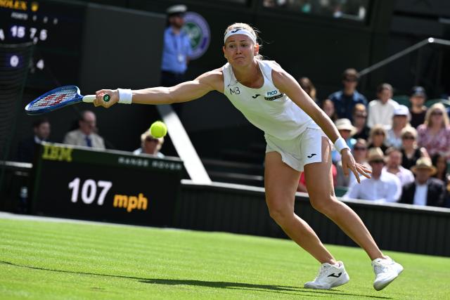 (250703) -- LONDON, July 3, 2025 (Xinhua) -- Marie Bouzkova hits a return during the women's singles second round match between Aryna Sabalenka of Belarus and Marie Bouzkova of the Czech Republic at the Wimbledon Tennis Championships in London, Britain, July 2, 2025. (Xinhua/Zhao Dingzhe)