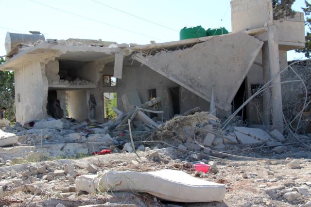 (250703) -- HAMA, July 3, 2025 (Xinhua) -- A damaged building is seen following a deadly explosion in the town of Jibrin, in Hama province, central Syria, on July 2, 2025. At least seven people were killed and several others injured on Wednesday in a fuel tanker explosion in the town of Jibrin in Syria's central Hama province, state media reported.
   The explosion, which occurred when a fuel tanker caught fire, resulted in the deaths of civilians and left an undetermined number of others injured, Syrian state broadcaster al-Ikhbariya reported. (Str/Xinhua)