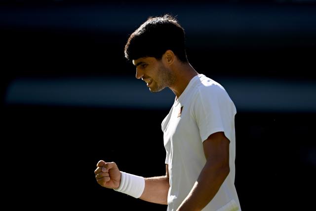(250703) -- LONDON, July 3, 2025 (Xinhua) -- Carlos Alcaraz celebrates scoring during the men's singles second round match between Carlos Alcaraz of Spain and Oliver Tarvet of Britain at the Wimbledon Tennis Championships in London, Britain, July 2, 2025. (Xinhua/Li Ying)