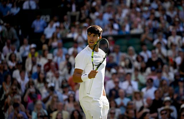 (250703) -- LONDON, July 3, 2025 (Xinhua) -- Carlos Alcaraz celebrates scoring during the men's singles second round match between Carlos Alcaraz of Spain and Oliver Tarvet of Britain at the Wimbledon Tennis Championships in London, Britain, July 2, 2025. (Xinhua/Li Ying)